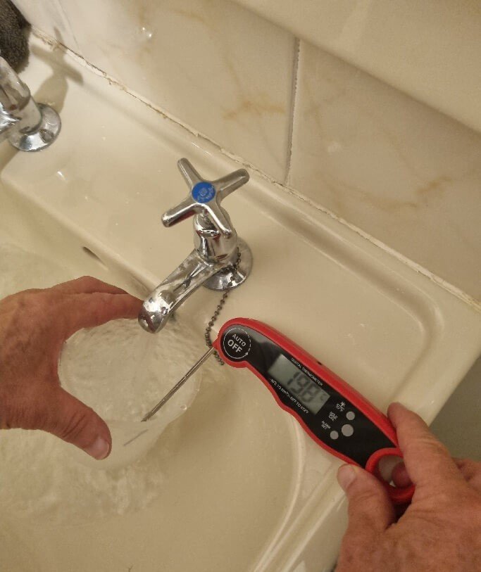 Hot water temperature check during a nursery Legionella assessment in Doncaster.