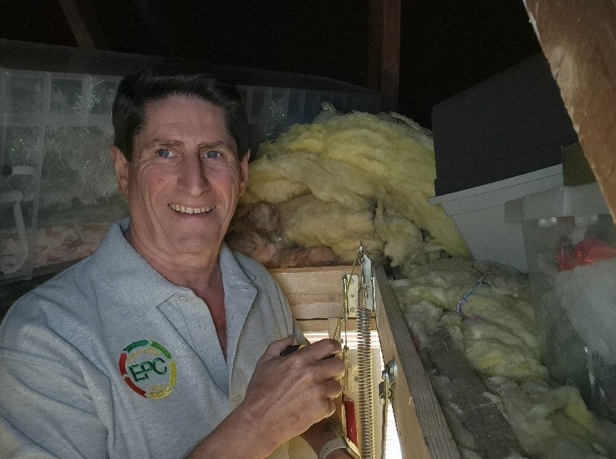 Checking insulation levels during an Energy Performance Certificate survey in Doncaster
