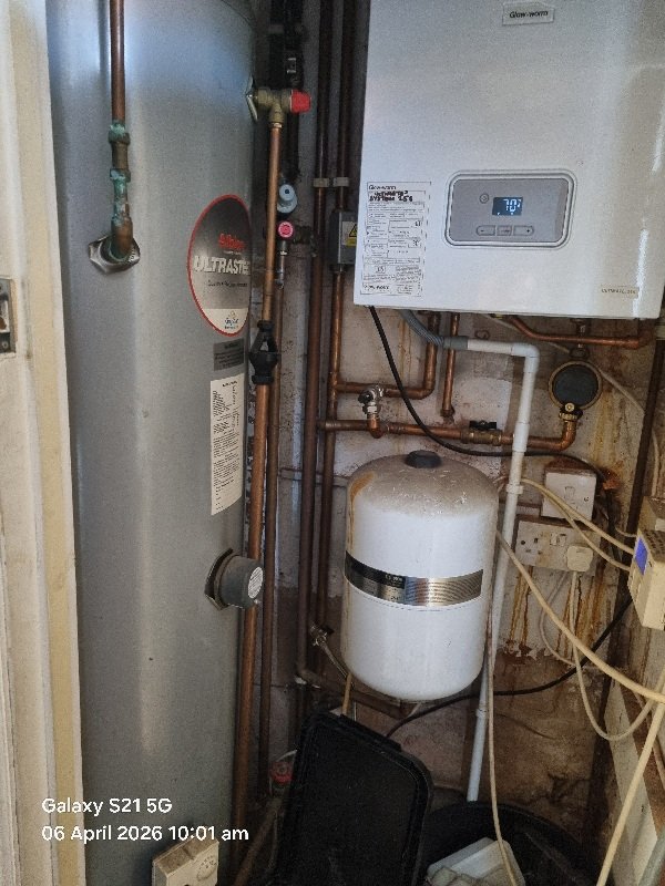 Inspection of domestic hot and cold water pipework during a professional Legionella risk assessment.