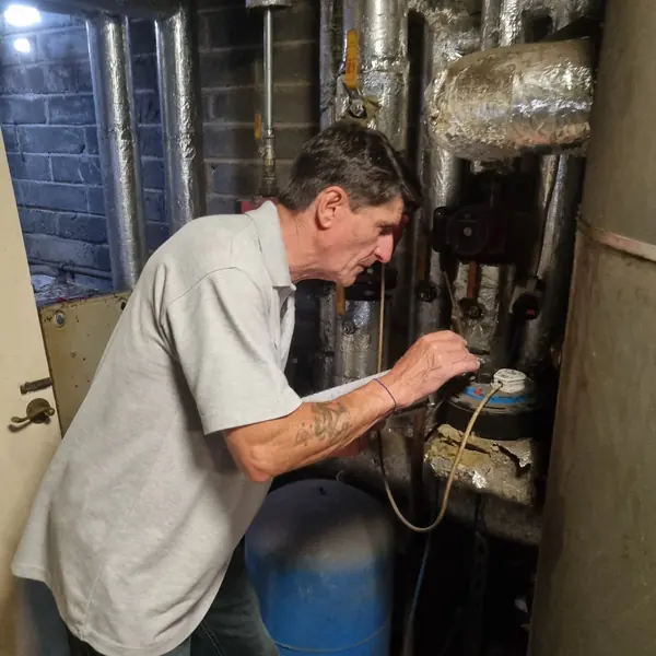 Commercial Legionella risk assessor inspecting a water system in Doncaster